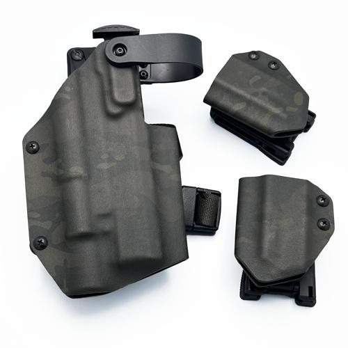 Complete tactical rig featuring a custom OWB Level 2 KYDEX holster for CZ Shadow 2 with Olight Baldr Pro R, and two matching single mag carriers in a MultiCam Black on Ranger Green pattern.