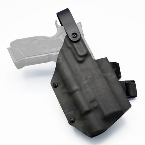 Custom light-bearing OWB Level 2 retention KYDEX holster for CZ Shadow 2 with Olight Baldr Pro R, featuring a MultiCam Black pattern on Ranger Green KYDEX sheet and tactical leg strap.