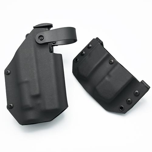 Black KYDEX OWB duty holster system with a safety retention hood, custom molded for a Glock 21 with a Streamlight TLR-1/HL weapon light, shown next to a matching double Kydex magazine pouch for Glock 21 mags.