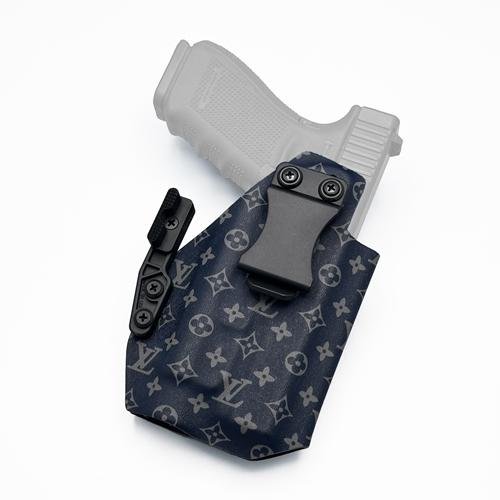 IWB KYDEX holster for Glock 21 with Streamlight TLR-1/HL, featuring a LV Eclipse pattern, wide FOMI belt clip, and Modwing concealment claw.