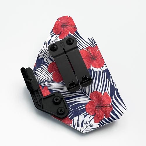 Tropical floral print KYDEX j frame holster featuring red hibiscus flowers, equipped with a DCC Monoblock and concealment wing.