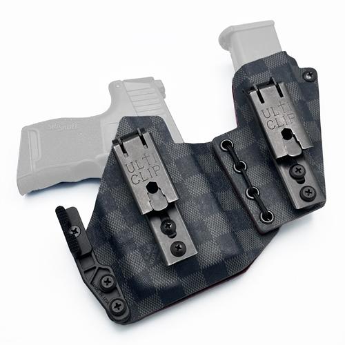LV Damier Graphite KYDEX IWB appendix rig p365 tlr-6 holster featuring an integrated magazine carrier, dual Ulticlip XL attachments, and a Light-Bearing Modwing concealment claw.