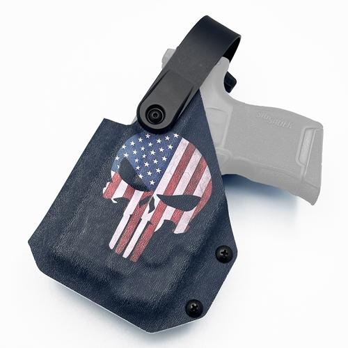 left-handed OWB Taco style SIG Sauer p365 Streamlight tlr-6 holster featuring an American flag Punisher skull, equipped with a Level 2 retention mechanism and Blade-tech Tek-Lok
