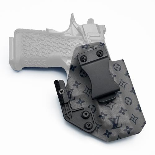 Custom IWB KYDEX Staccato C2 holster featuring a LV Eclipse Reverse pattern, equipped with a quick clip and a modwing