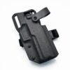 Black KYDEX Holster for SIG P320 showing Level 2 thumb release locking mechanism