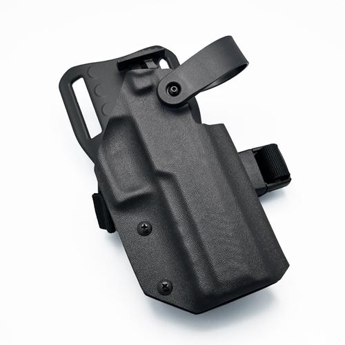 Black KYDEX Holster for SIG P320 showing Level 2 thumb release locking mechanism
