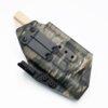 Right-handed IWB Kydex holster in A-TACS iX camo pattern for Glock 17 and Glock 19 with Surefire X300 flashlight, featuring DCC Monoblock clip and Modwing to minimize printing.