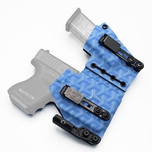 Custom 2-piece appendix rig G26 tlr-6 holster in blue Goyard pattern featuring Ulticlips and a Modwing (ซองพกในแบบ Appendix Rig แยกชิ้น สำหรับ Glock 26 ติดไฟฉาย TLR-6 ลาย Goyard สีฟ้า พร้อม Ulticlip 3.3 และ Modwing)
