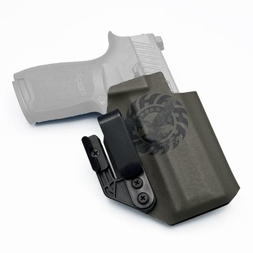 Ranger green KYDEX IWB holster equipped with a Tacware Angled Clip and Modwing, holding a SIG Sauer P320 3.9" Barrel