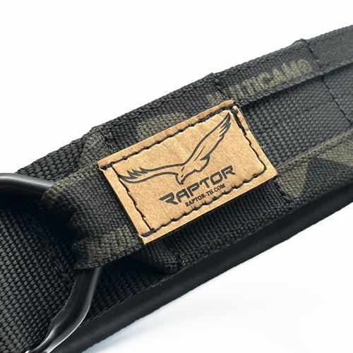 Close up of RAPTOR Tier 1 belt in MultiCam Black with D-Ring and RAPTOR logo tag